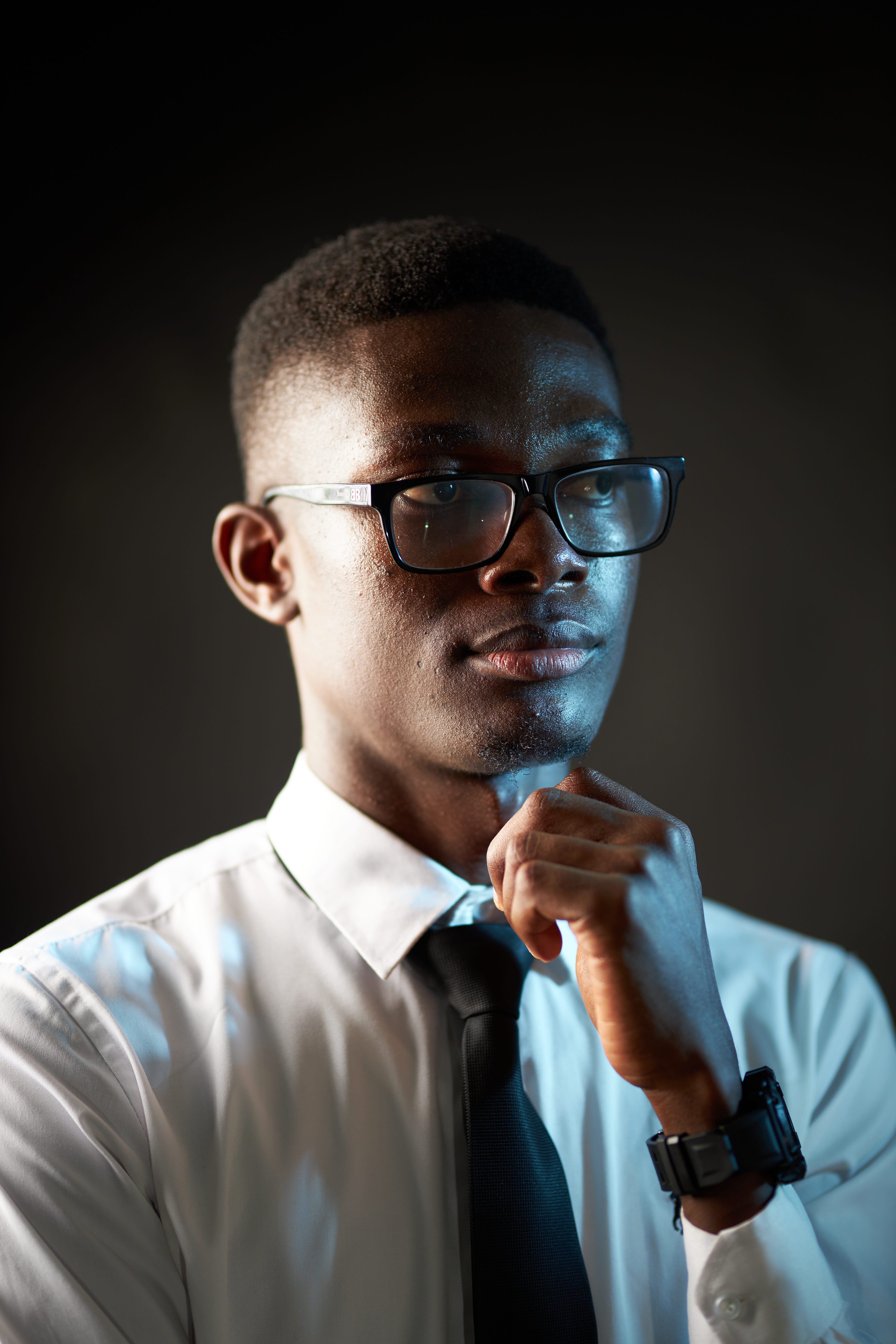 Eugene Antwi - Close-up with screen reflection in glasses